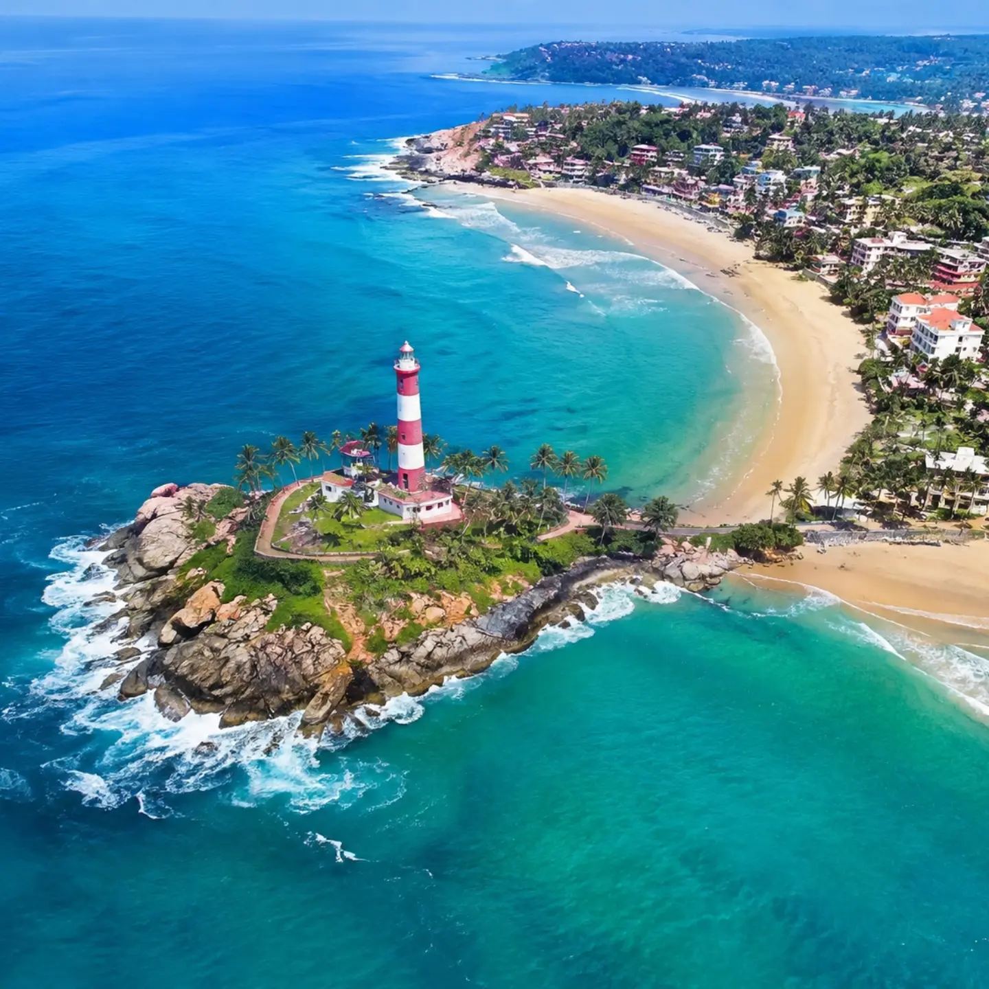 Aerial view of the lighthouse and beach at Kovalam, Kerala